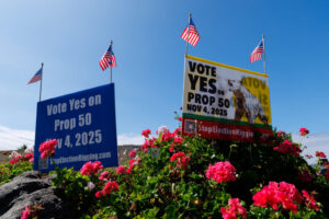 Yes on proposition 50 signs for redistricting in California